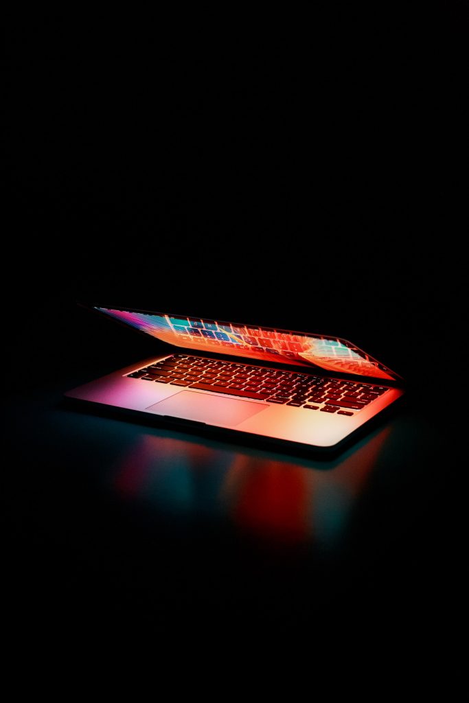 Laptop in dark background